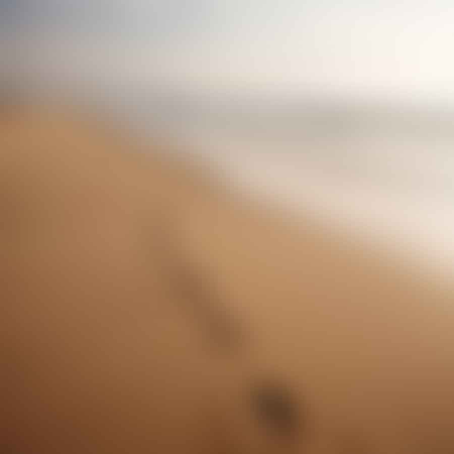 Footprints in the sand, symbolizing minimal impact on the beach